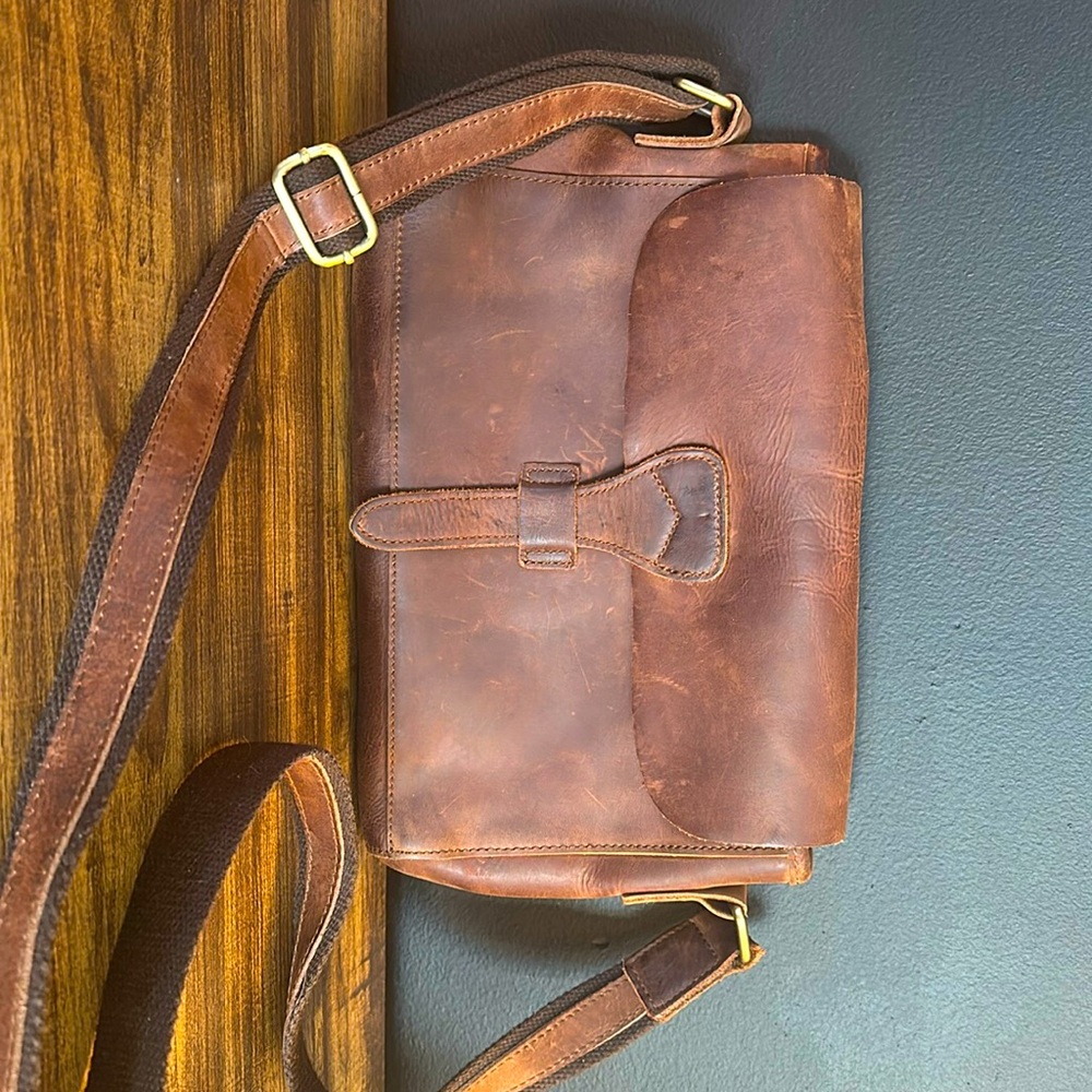 Brown Jesslyn Blake crossbody bag.